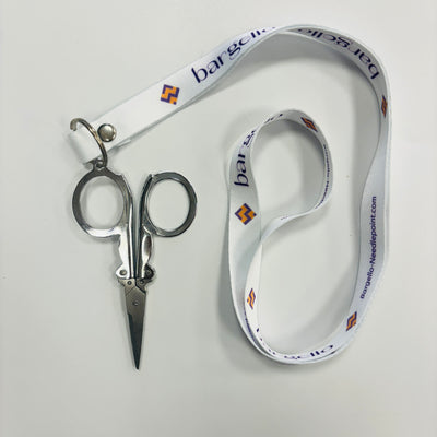 Folding travel scissors on a lanyard